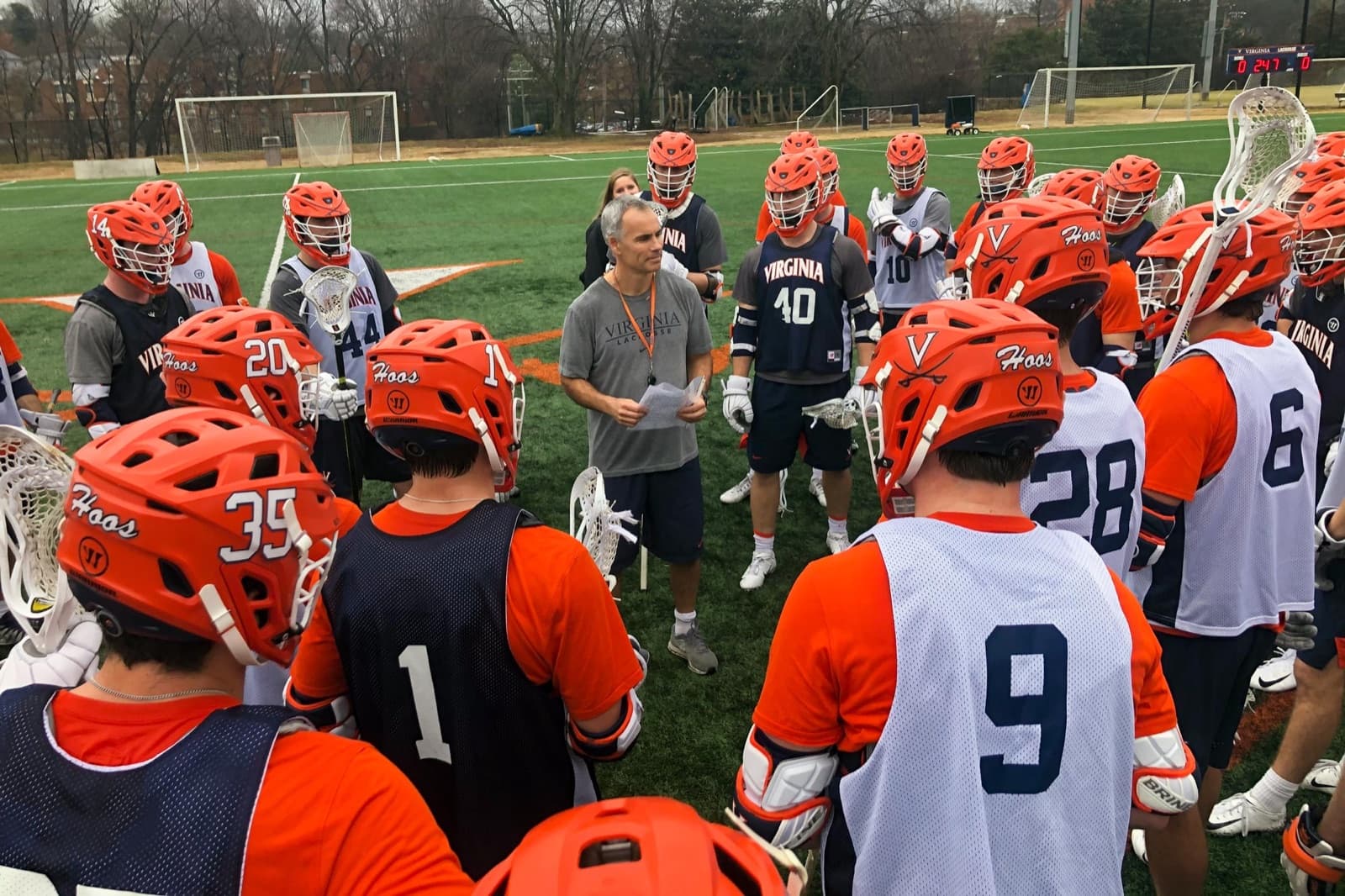 XD10 Academy team huddle on the field