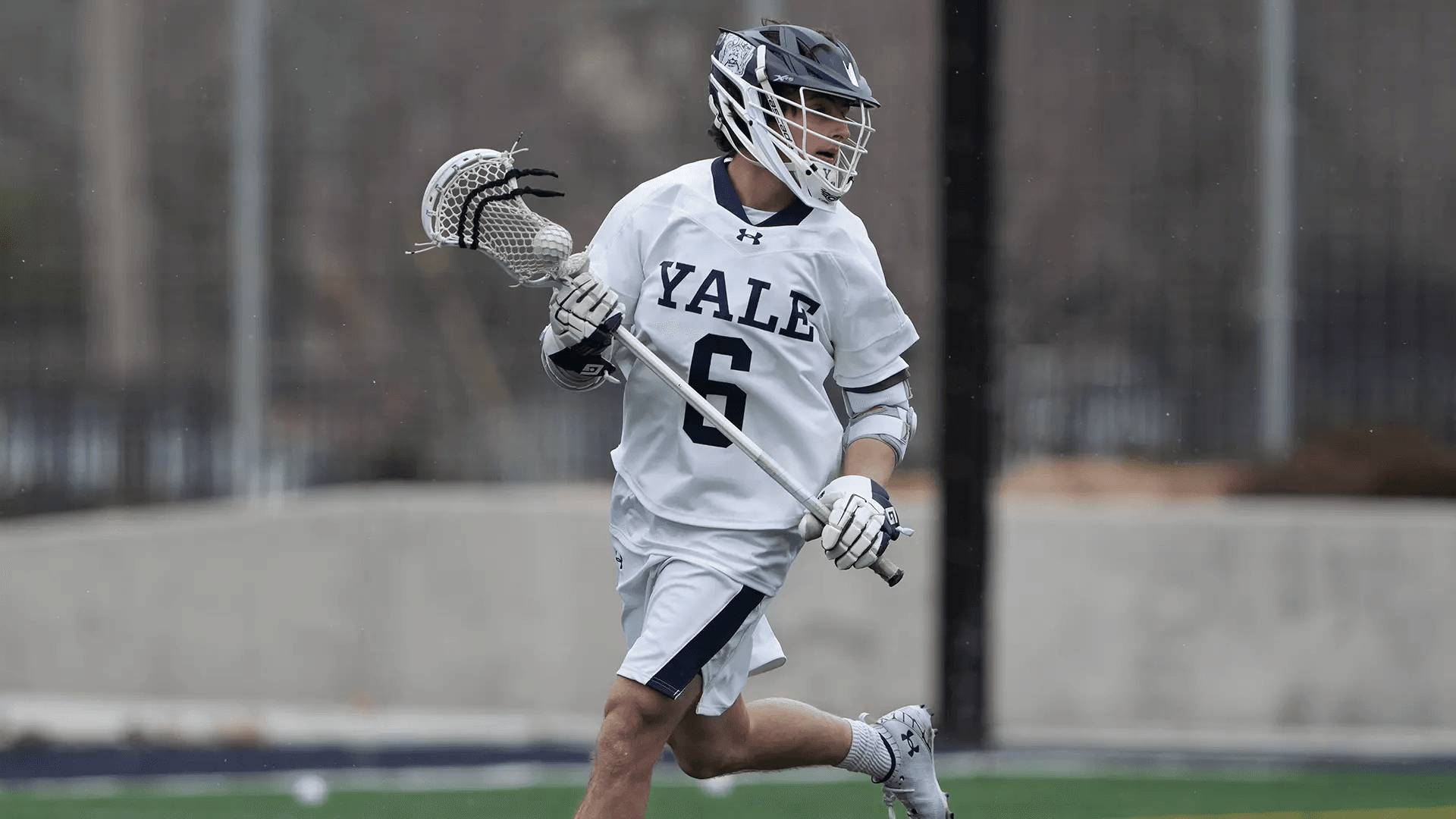 Leo Johnson running with the ball for Yale University